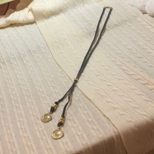 Lucky Brand black suede lariat with gold accent
